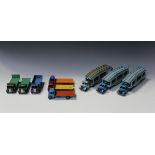 A collection of Dinky Toys and Supertoys commercial vehicles, including Guy wagons, flatbed