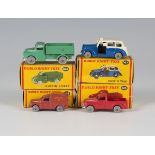 Four Dublo Dinky Toys vehicles, comprising a No. 064 Austin lorry, a No. 065 Morris pick-up, a No.