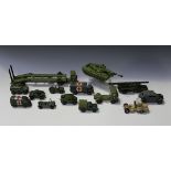 A large collection of Dinky Toys and Supertoys army vehicles and accessories, including tank