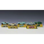 Five Dinky Toys sports and racing cars, comprising a No. 107 Sunbeam Alpine sports, a No. 109 Austin