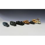 A collection of Corgi Toys military vehicles, including a mobile radar, two quad gun tractors and