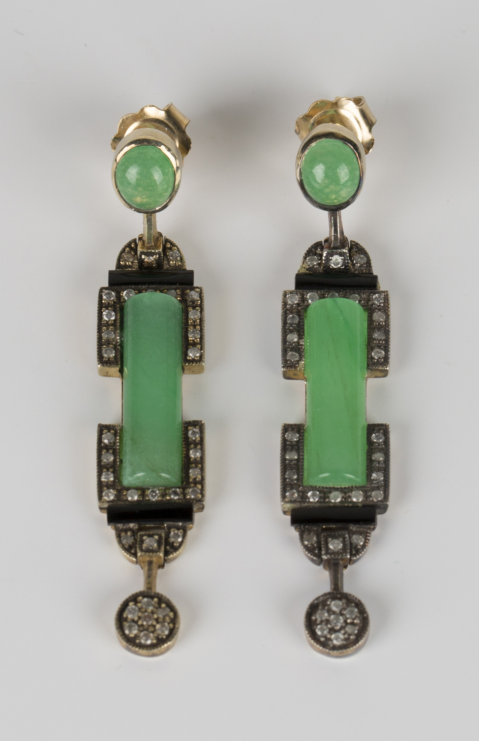 A pair of gold, green stained agate, diamond and onyx pendant earrings in an Art Deco style