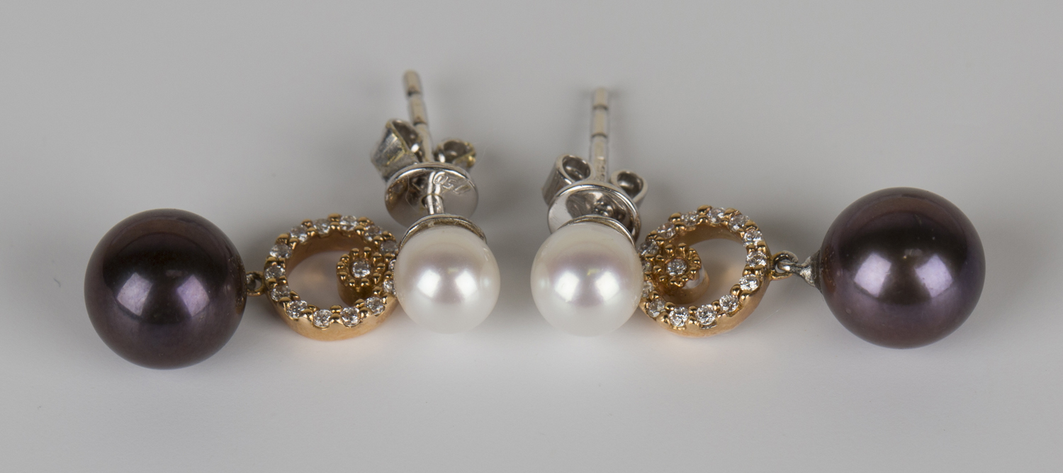 A pair of 18ct white gold, diamond and cultured pearl pendant earrings, each mounted with the