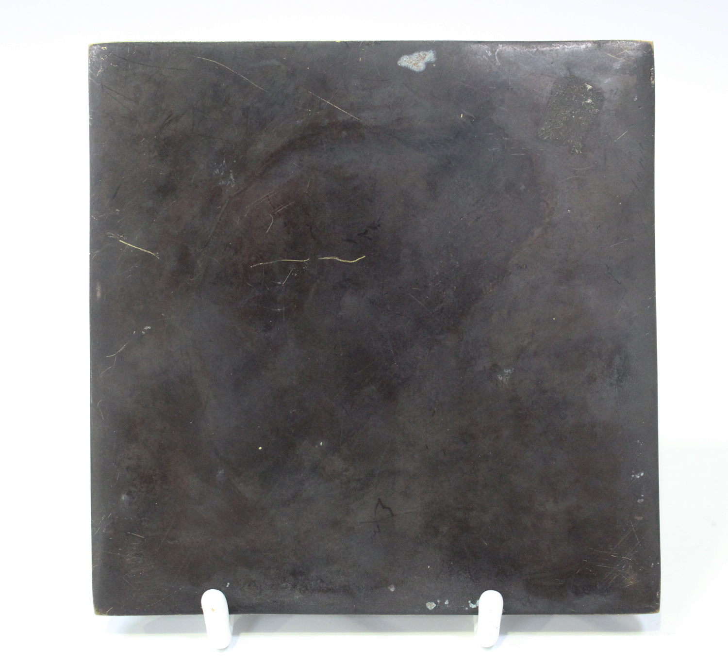 A Chinese archaic bronze square mirror, probably Warring States period (480-221 BC), one side cast - Image 2 of 2