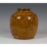 An unusual West Country slipware vase, 19th century, the jar shaped body decorated in yellow with