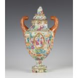 A Chinese Canton famille rose enamelled export porcelain urn and cover, early 19th century, the body