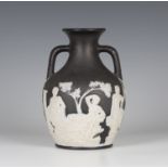 A jasperware black ground Portland vase, probably Wedgwood, 19th century, typically decorated in