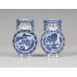A pair of Chinese blue and white porcelain miniature moon flasks, late 19th/early 20th century, each