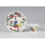 A Chinese famille rose porcelain wine cup and saucer, Yongzheng period, each piece painted with a