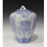 A Japanese Hirado blue and white porcelain jar and cover, Meiji period, the ovoid body painted
