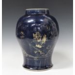 A Chinese blue glazed and gilt decorated porcelain jar, 18th century, the baluster body gilt with