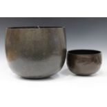 A Japanese brown patinated hammered bronze temple gong/singing bowl, Meiji period, height 31.5cm,