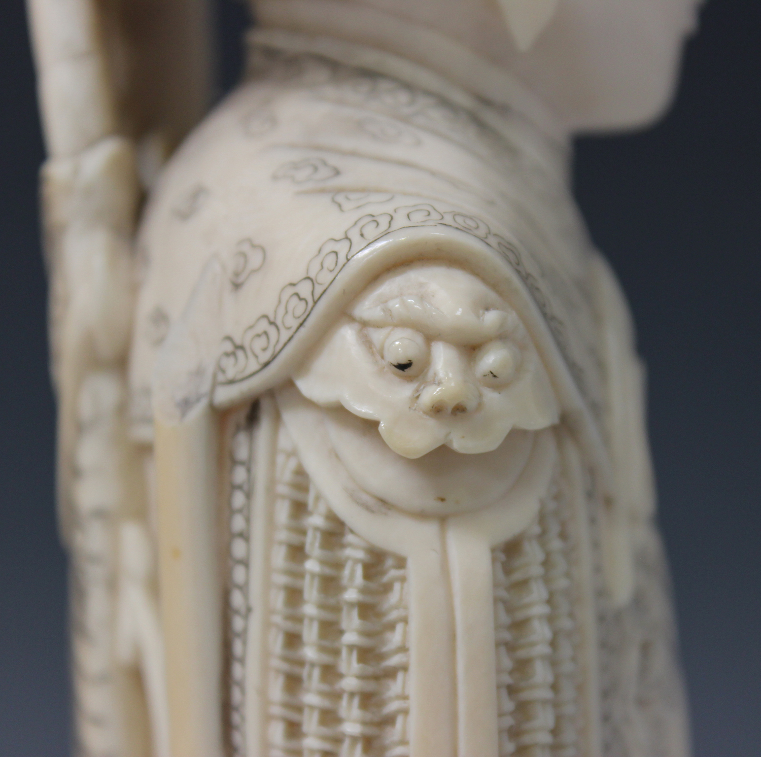 A Japanese carved and stained ivory figure of a female warrior, early 20th century, modelled - Image 6 of 13