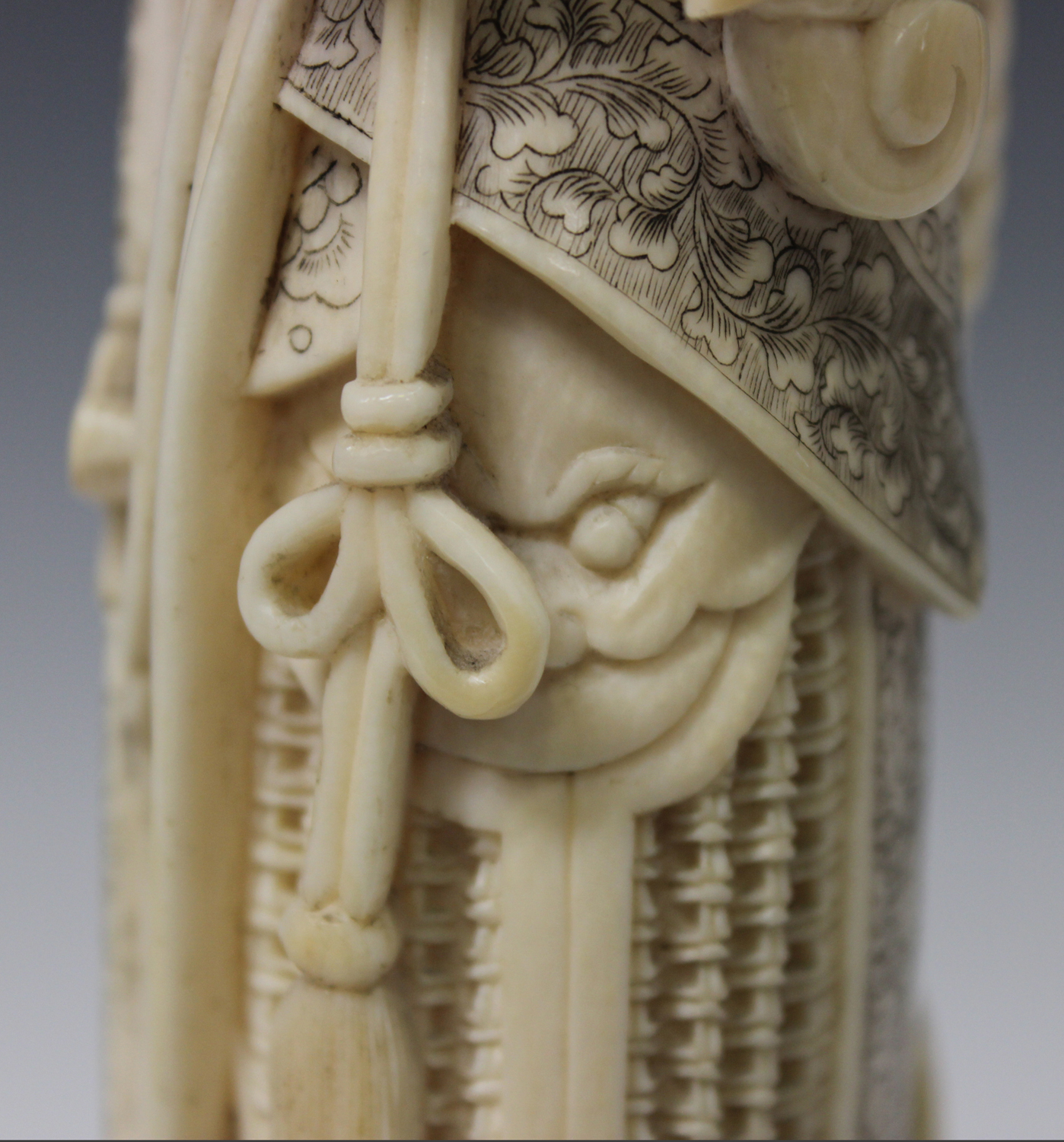 A Japanese carved and stained ivory figure of a female warrior, early 20th century, modelled - Image 4 of 13