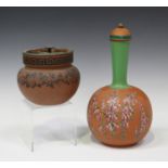 A terracotta colour stoneware water bottle and cover, second half 19th century, the spherical body