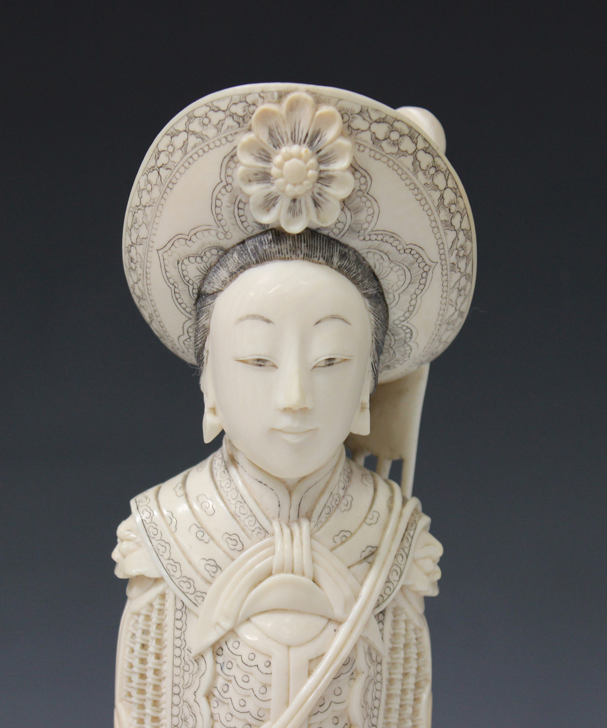 A Japanese carved and stained ivory figure of a female warrior, early 20th century, modelled - Image 10 of 13