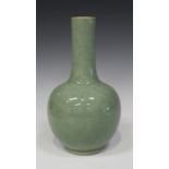 A Chinese celadon glazed bottle vase, late Qing dynasty, of globular form with narrow neck,
