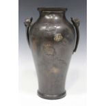 A Japanese brown patinated bronze vase, Meiji period, the baluster body decorated in low relief