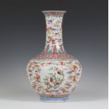 A Chinese famille rose enamelled porcelain bottle vase, mark of Guangxu and probably of the