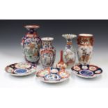 A collection of Japanese porcelain, Meiji period and later, including Imari dishes and vases, a