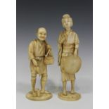 Two Japanese carved sectional ivory okimono figures, Meiji period, one modelled as a lady carrying a