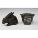 A Japanese brown patinated metal figure of a rabbit, early 20th century, stamped seal mark to