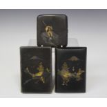 A group of three Japanese komai style damascened iron cigarette cases, 20th century, each of