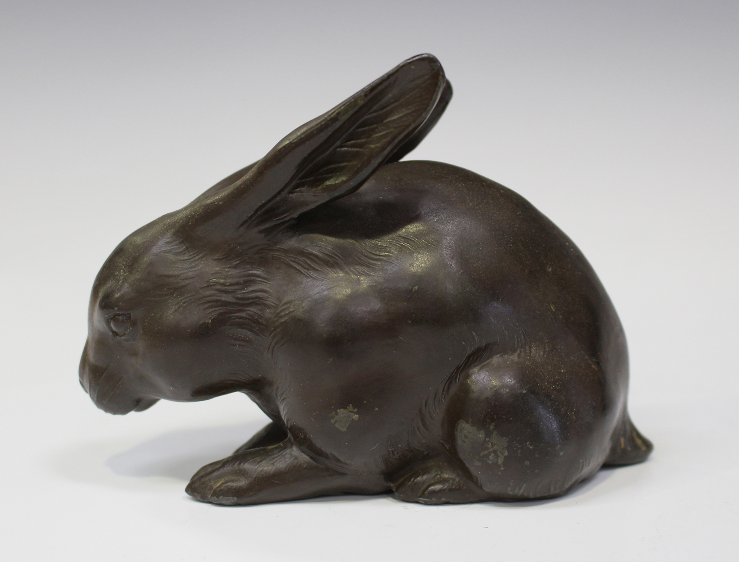 A Japanese brown patinated metal figure of a rabbit, early 20th century, stamped seal mark to - Image 14 of 14