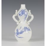 A Japanese Hirado blue and white porcelain vase, Meiji period, the double gourd shaped body