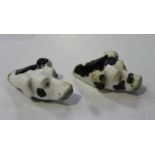 Two Staffordshire porcelain dog whistles, circa 1830, both modelled as the head of a white hound