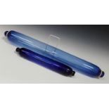 A large blue glass rolling pin, late 19th century, length 78cm, together with a smaller example,