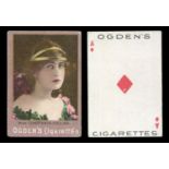 A collection of Ogdens cigarette cards in twelve albums, all odds, many duplicates, including 38