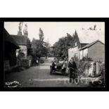 A photographic postcard titled 'Nutbourne' published by Walter Drewett, depicting a postman on a