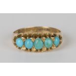 An 18ct gold and turquoise five stone ring, mounted with a row of oval turquoise, Birmingham 1909,