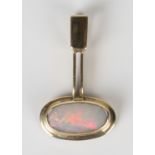 A 9ct gold and opal single stone pendant, mounted with an oval opal, length 3cm.Buyer’s Premium 29.