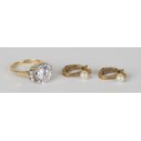 A 14ct gold and colourless gem set dress ring and a pair of gold and single cultured pearl earclips,