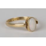 An 18ct gold ring, mounted with an oval opal, Birmingham 1907, ring size approx N1/2.Buyer’s Premium