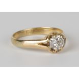 A gold and diamond single stone ring, claw set with a circular cut diamond, detailed '18ct', ring