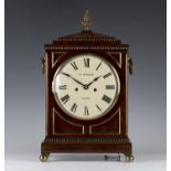 A Regency mahogany bracket clock with eight day movement striking hours on a bell with pull repeat