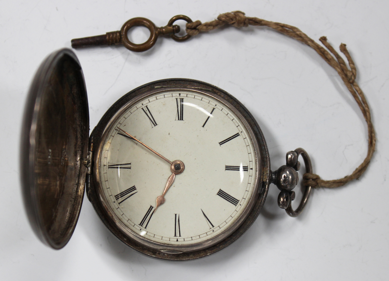 A silver cased keywind hunting cased gentleman's pocket watch with a gilt fusee movement, detailed