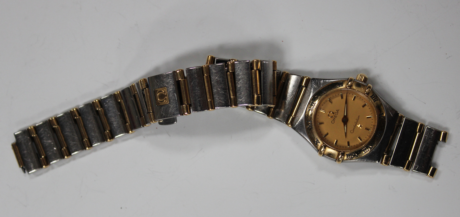 An Omega Constellation steel and gilt lady's bracelet wristwatch, the signed gilt dial with gilt - Image 2 of 5