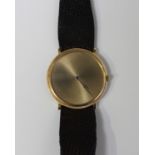 A Piaget 18ct gold circular cased gentleman's wristwatch with plain gilt dial, the case with