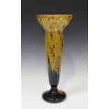 A Daum Nancy slender glass vase, first half 20th century, in shades of yellow, orange and dark