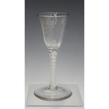 A double series opaque twist stem wine glass, mid-18th century, the rounded funnel bowl with basal