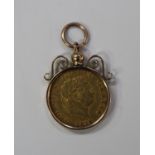 A George III half-sovereign 1818 in a gold pendant mount, detailed '9ct'.Buyer’s Premium 29.4% (