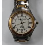 An Asprey & Garrard London Oceana gilt and steel gentleman's bracelet wristwatch, the signed dial