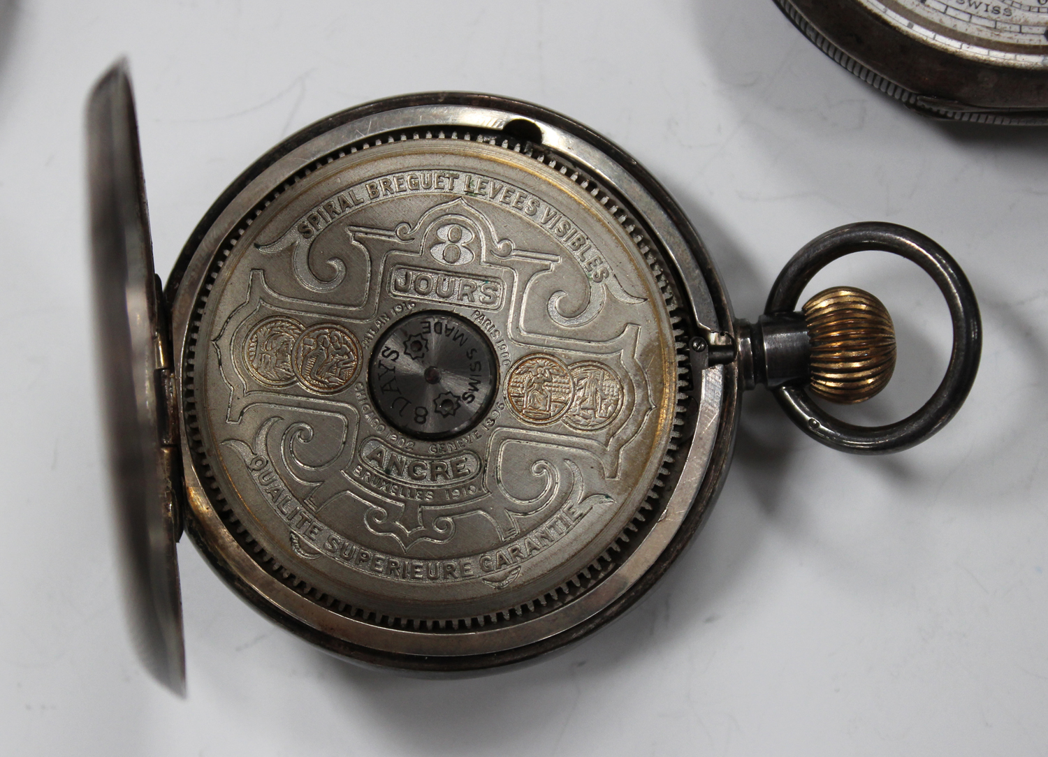 A silver cased keyless wind open-faced pocket watch with visible escapement, detailed 'Hebdomas - Image 3 of 3
