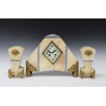 An Art Deco gilt metal mounted marble clock garniture, the clock with eight day movement striking on