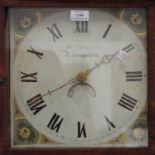 An early 19th century oak longcase clock with thirty hour movement striking on a bell via an outside