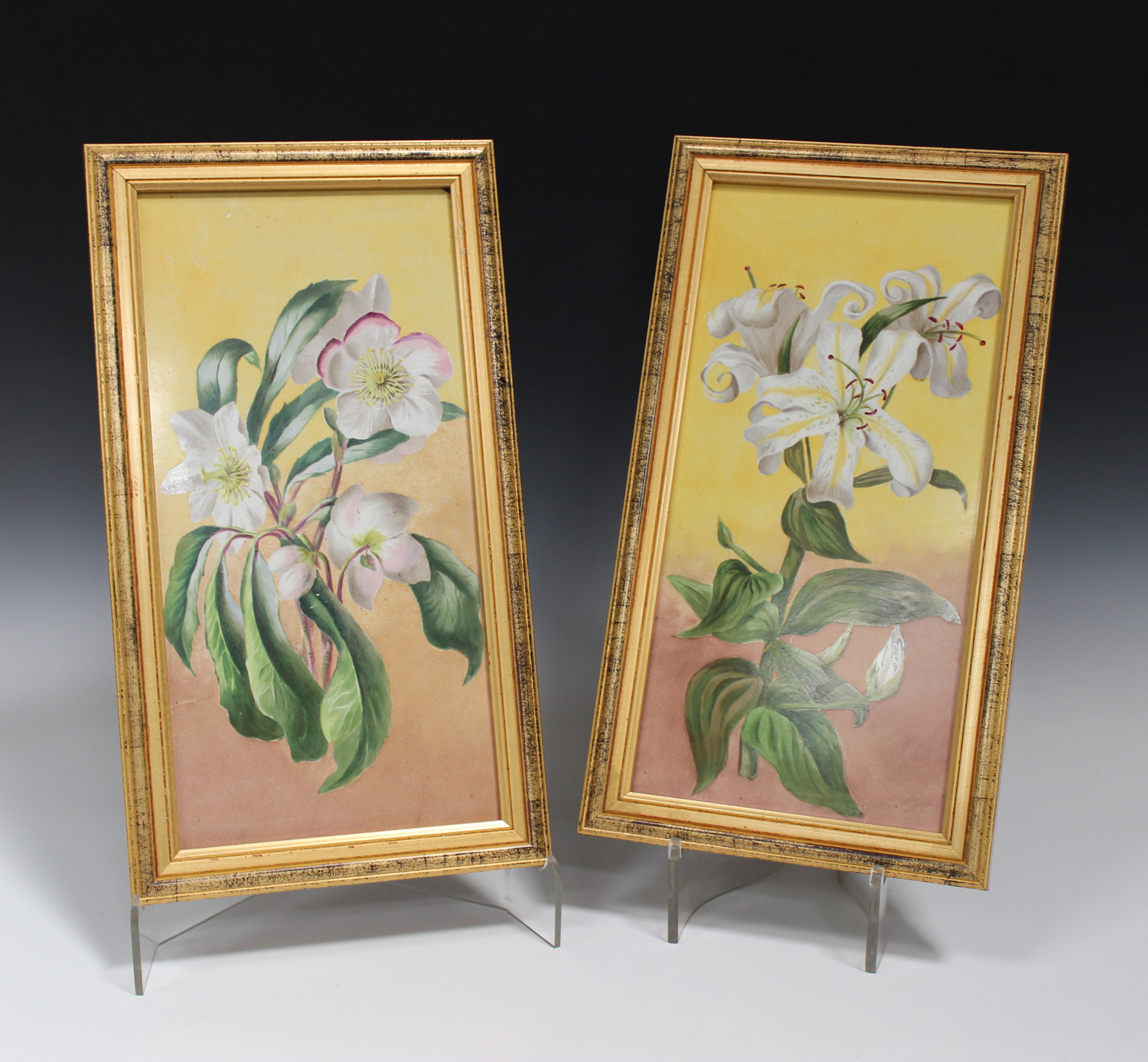 A pair of Mintons pottery rectangular tiles, late 19th century, each painted with a floral study,